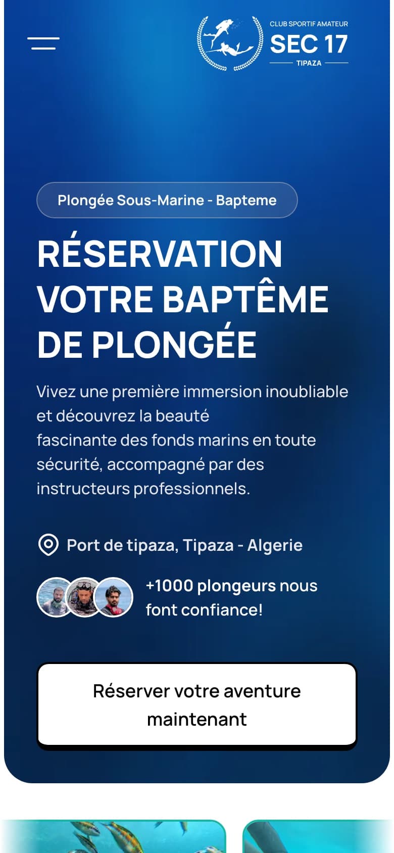 The same reservation page at phone width: the hero headline, the location, a “+1000 divers trust us” line, and a full-width booking button within thumb reach.